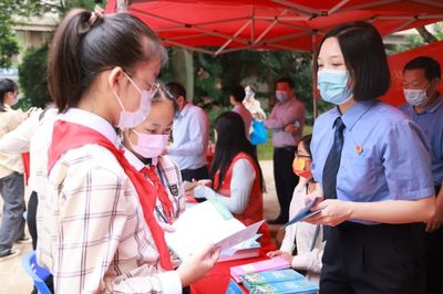 广西“送法进万家 家教伴成长”-2022年全国家庭教育宣传周主题宣传活动在良庆区举行